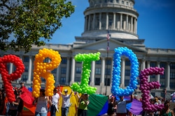 (Trent Nelson  |  The Salt Lake Tribune) People march from the Utah Capitol in Salt Lake City to kick off the Utah Pride Festival on Saturday, June 1, 2024.