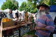 (Francisco Kjolseth  | The Salt Lake Tribune) Steven Mountford of White Lake Farm, a 15-year veteran of the Downtown Farmer's Market in Salt Lake City, sells his honey on Saturday, June 7, 2025. A new building is being proposed at the park, designed to house portions of the market and activate the urban park year-round.
